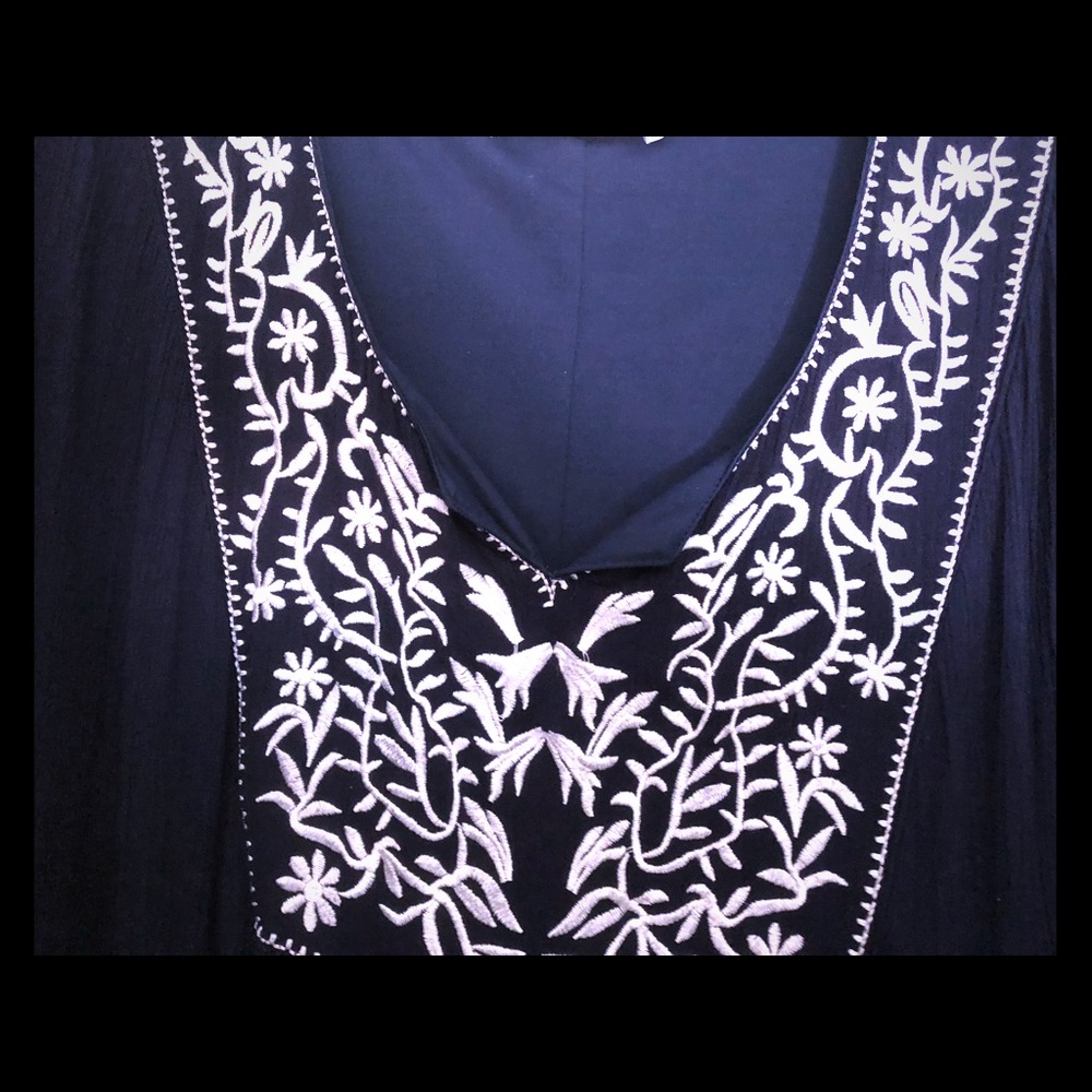 Navy blue plus dress with flutter sleeves.